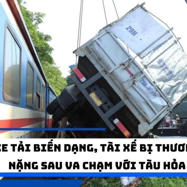 Xe tải biến dạng, tài xế bị thương nặng sau va chạm với tàu hỏa